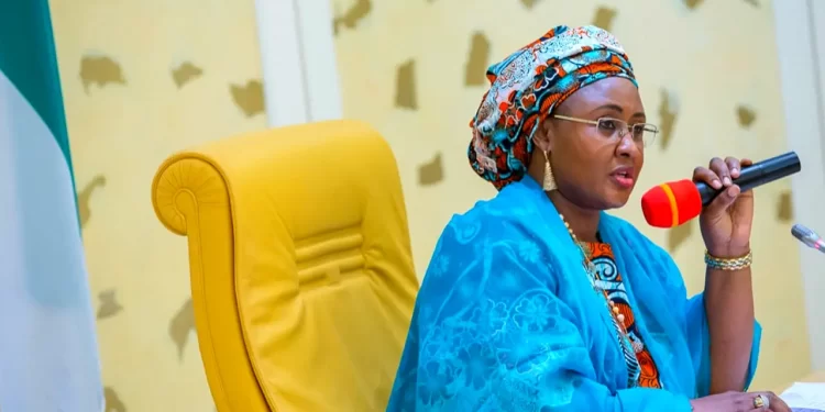 Aisha Buhari decorates ADC, Shugaba with new rank