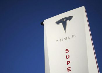 Hit by China shutdown, Tesla boosts auto prices and sells bitcoin