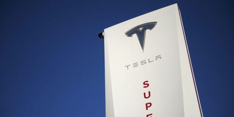 Hit by China shutdown, Tesla boosts auto prices and sells bitcoin