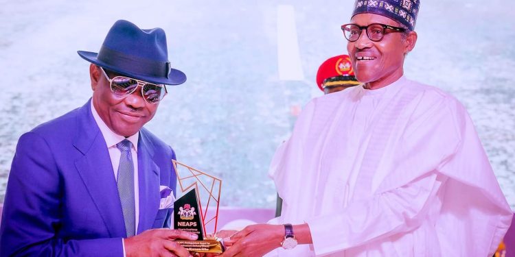 Pictorial: Buhari honours Wike, others with service award