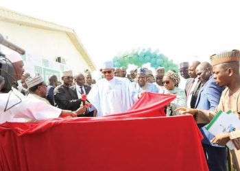 Buhari’s Kano visit: Protesting youths barricade roads, stone helicopter