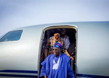 Shun rumours, I’m strong, Tinubu says on arrival from France